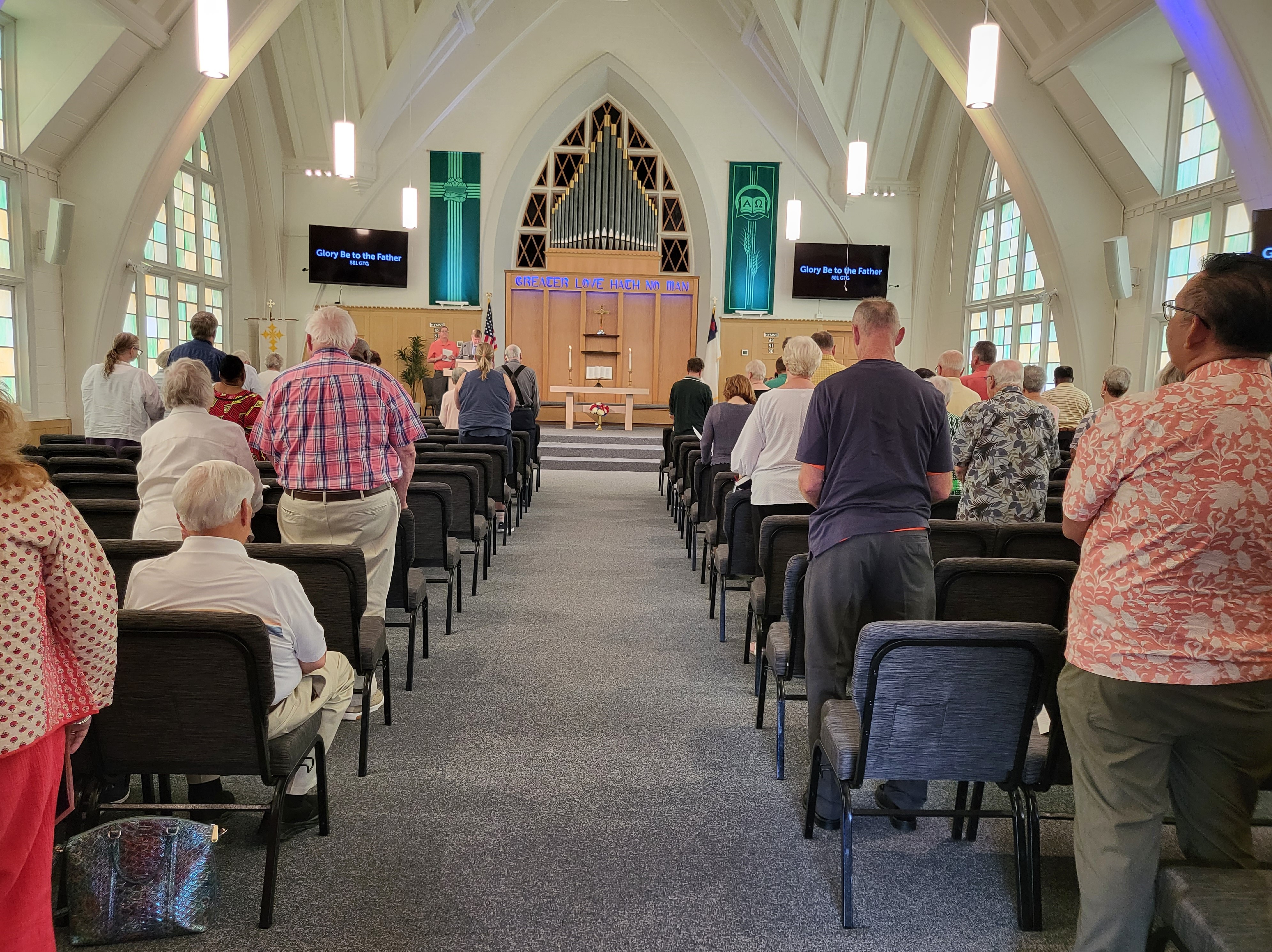 Congregants of Grace Church PC USA standing.